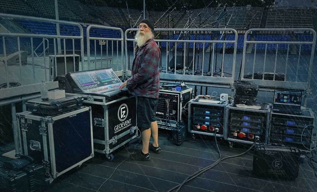GeoEvent audio engineer at the front-of-house console before a show