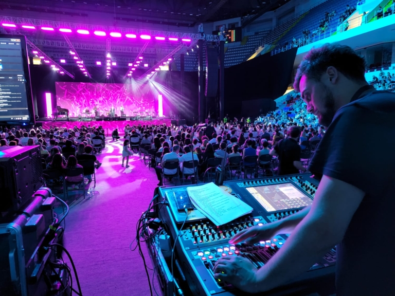 Live event production with stage lighting and sound